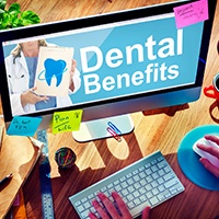 a person searching their dental benefits on the internet