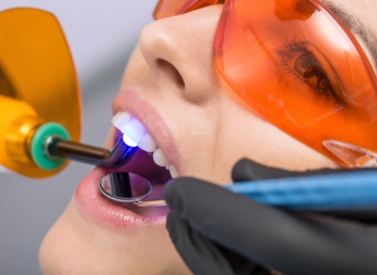 Patient receiving cosmetic dental bonding