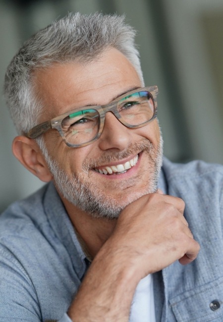 Man with dentures smiling