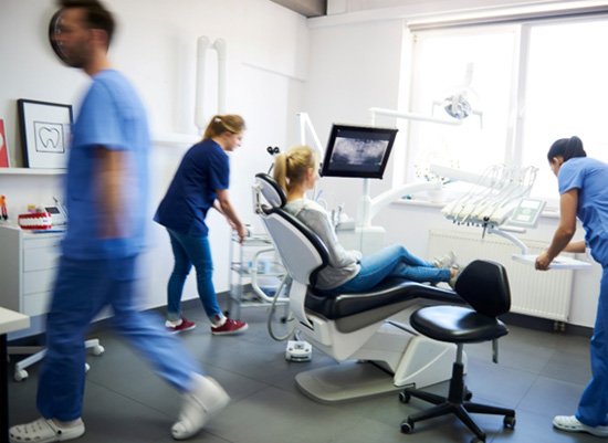 an emergency dental team walking around a room