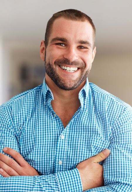 Man smiling after extraction site preservation