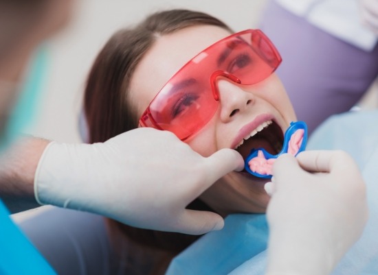 Patient receiving fluoride treatment