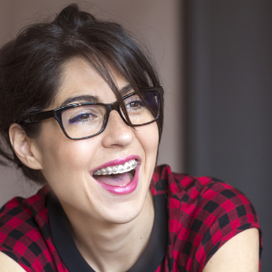 Woman with braces smiling