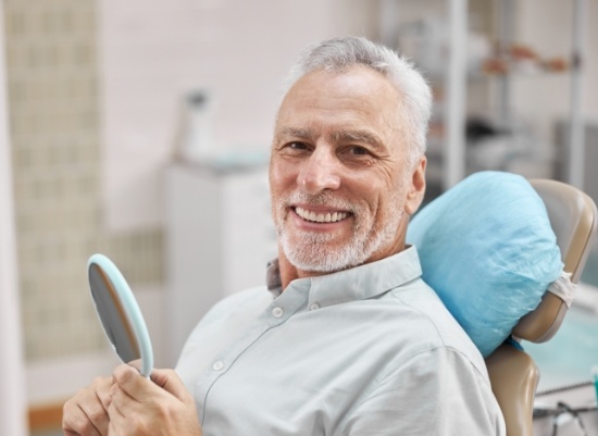 Man sharing smile after inlay and only restoration