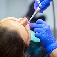 A closeup of a sedated dental patient