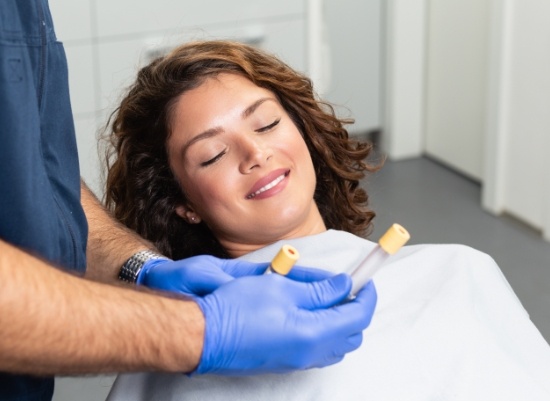 Patient smiling during platelet rich plasma treatment