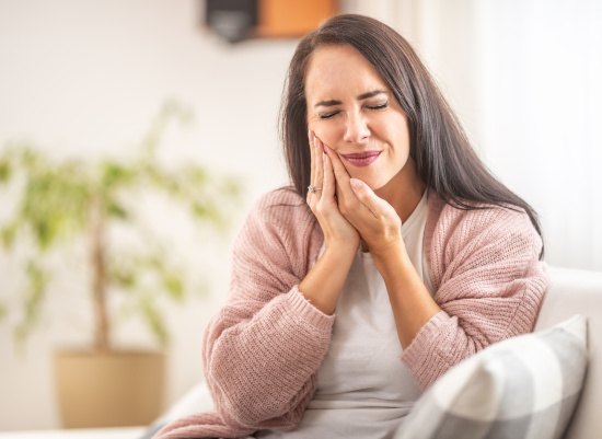 Woman suffering from a toothache