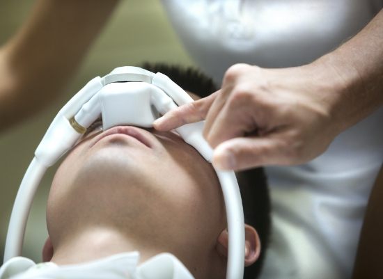 Patient receiving nitrous oxide dental sedation treatment