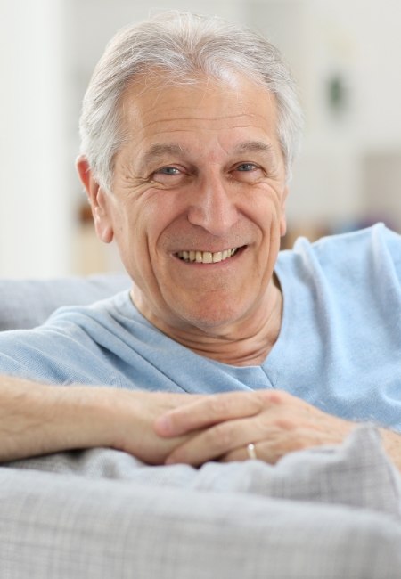 Man with healthy smile after soft tissue grafting