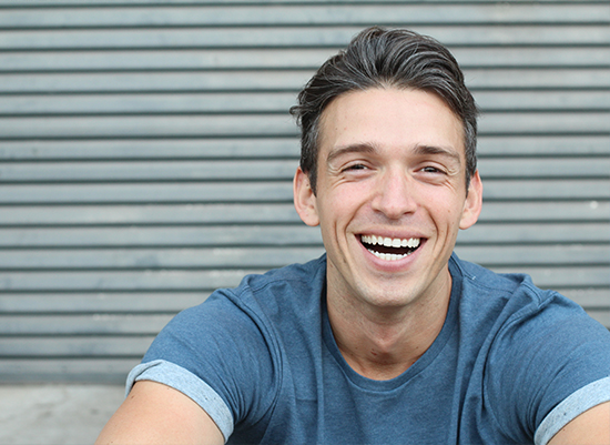 Man sharing healthy smile after dental appointment