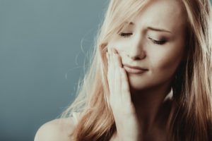 woman with mouth pain