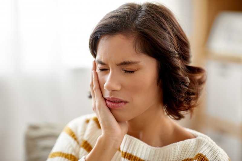Woman experiencing a toothache