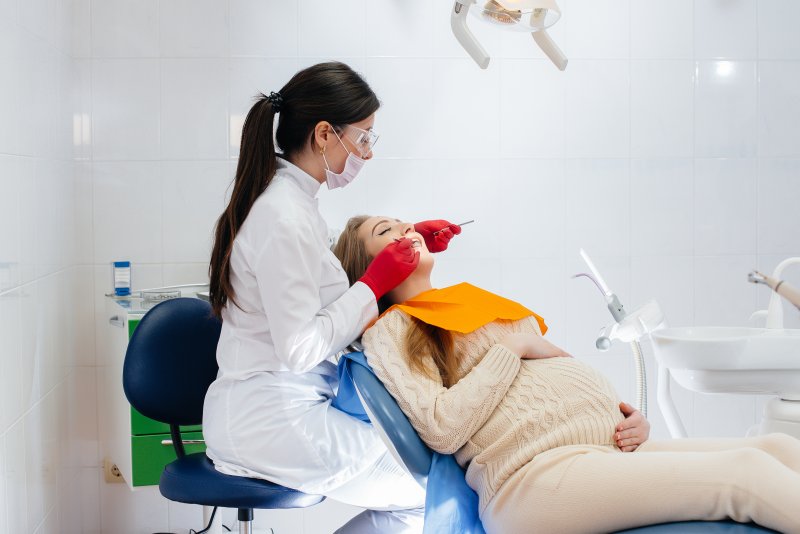 pregnant woman having dental checkup 