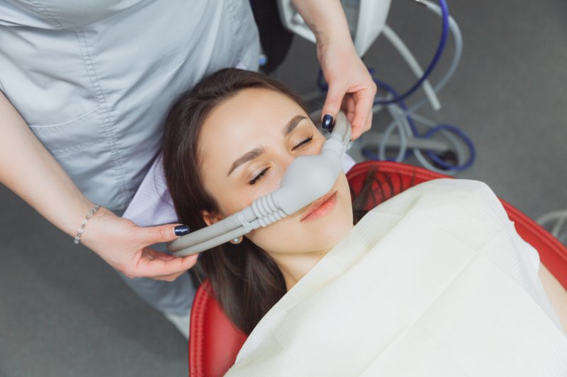 A woman receiving sedation dentistry 